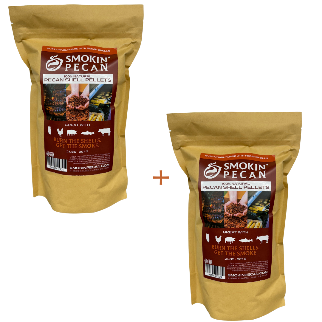 Two brown 2 lb bags of Smokin' Pecan Pecan Shell Pellets, each showing grilled meat and food icons, with a plus sign between them on a white background.