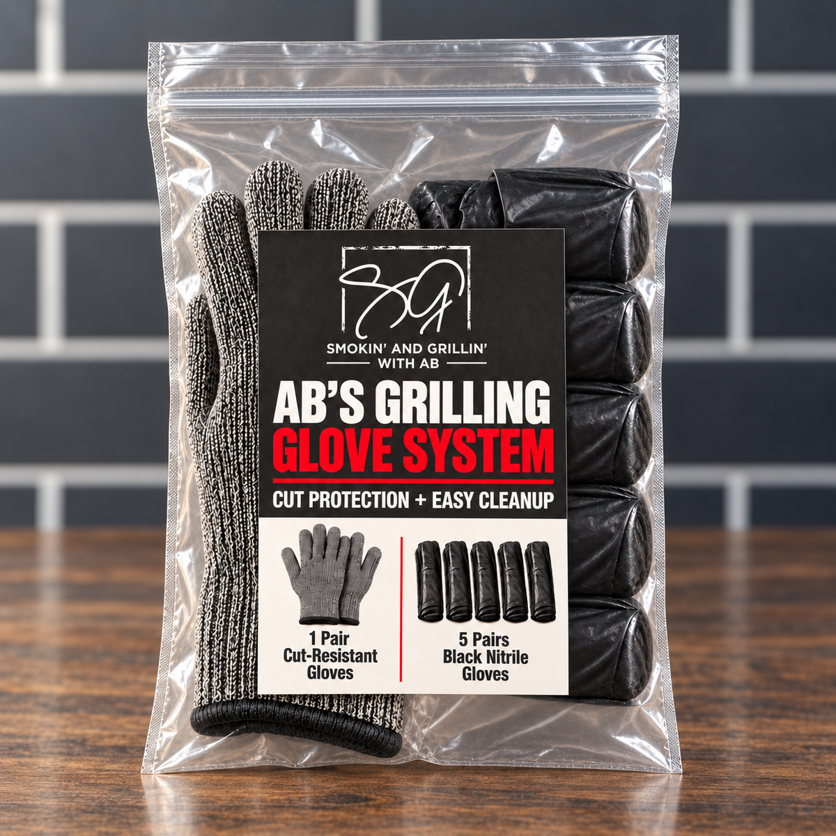 A sealed package of AB’s Grilling Glove System from Smokin and Grillin wit AB rests on a wooden surface, featuring one pair of cut-resistant gloves and five pairs of black nitrile gloves inside, with product details and branding for the grilling glove system clearly visible.