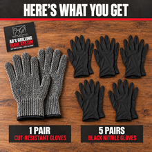 A set includes one pair of gray cut-resistant gloves, five pairs of black nitrile gloves, and a product info card from the Smokin and Grillin wit AB brand, all arranged on a wooden surface. Text above reads, Here’s what you get with the AB’s Grilling Glove System.