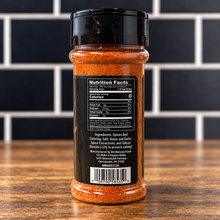 A plastic jar of AB’s Bayou Seasonin’ showing the nutrition facts, ingredients list, and barcode on its back.