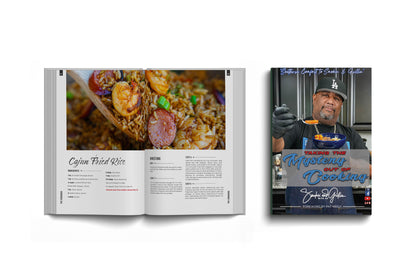 Two images: an open "Taking the Mystery out of Cooking Cookbook" from Smokin and Grillin wit AB showing a Cajun Fried Rice recipe with dish photo, and the cover featuring a chef holding food and the cookbook’s title.