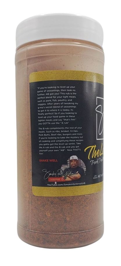 A clear plastic spice container, labeled A-Rub, The Level Up by Sweet Smokie Joe, with a black and yellow label that features a man in a cap and apron. The reddish seasoning rub inside enhances pork and other light meat recipes.
