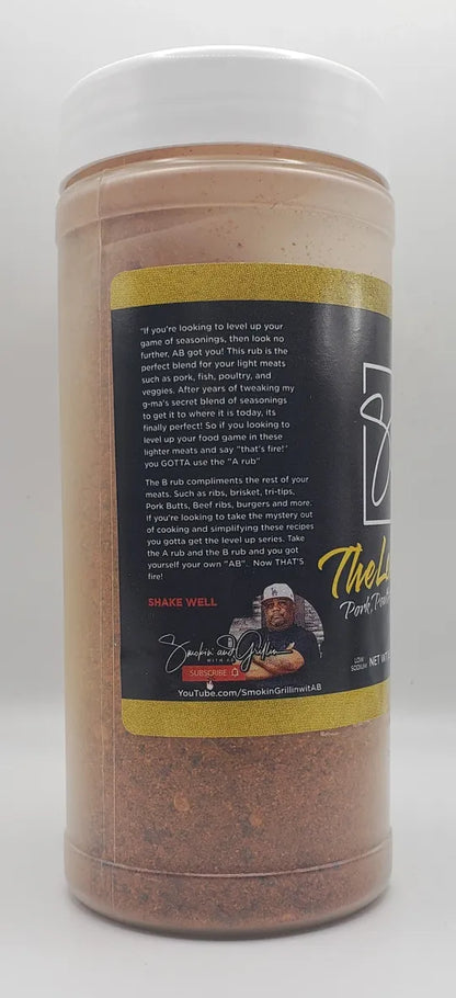 A-Rub, The Level Up by Sweet Smokie Joe comes in a plastic container with reddish-brown seasoning, featuring a black and yellow label with tips for light meats and a small photo of someone grilling to enhance your recipes.
